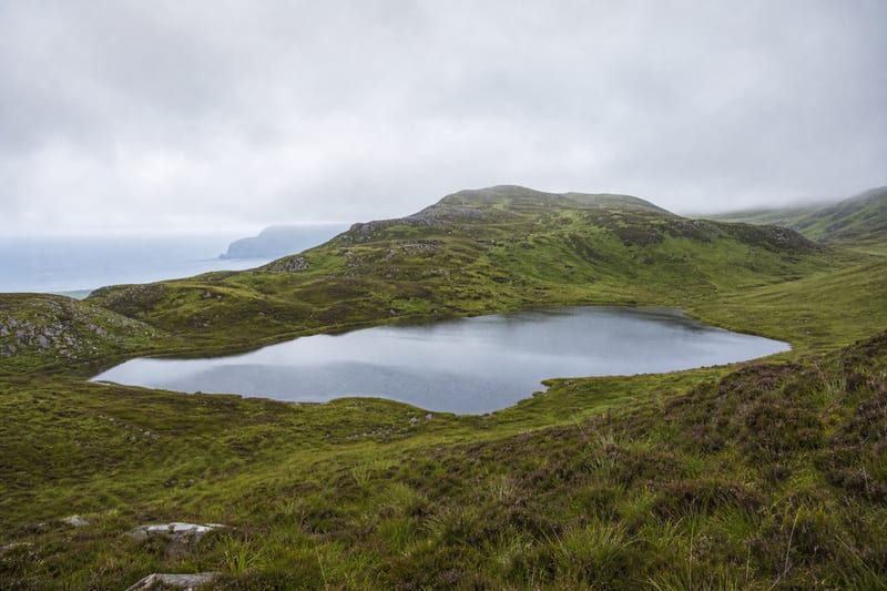 Misty mountain lake in the glens